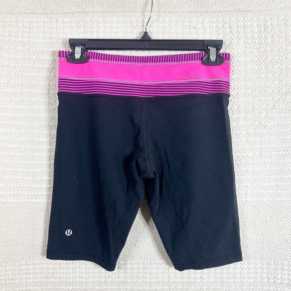 LULULEMON black and pink Reverse Groove reversible bike shorts 6 TALL - Picture 1 of 8